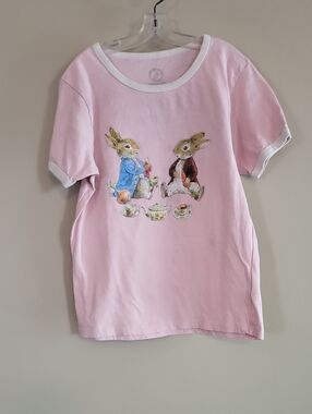 Beatrix Potter light pink tee shirt with white neck and sleeve trim